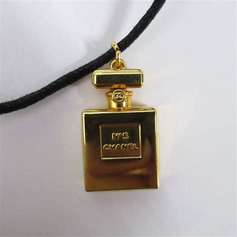 chanel no 5 jewelry|Chanel number 5 necklace.